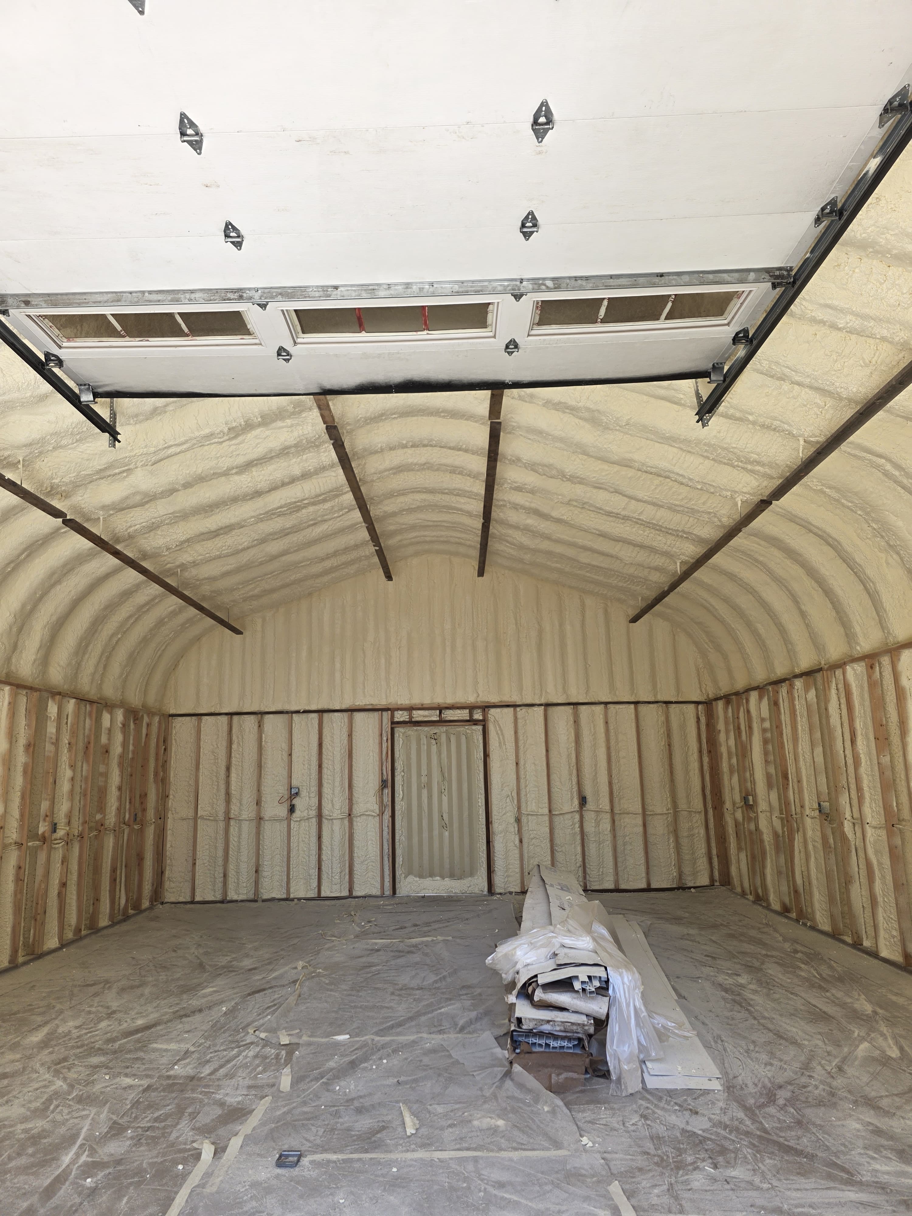 AT Foam crew completing spray foam insulation on commercial property — Washington State